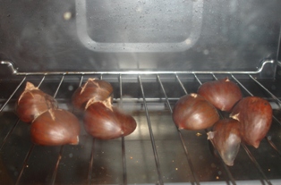 Spread the chestnuts on a baking pan