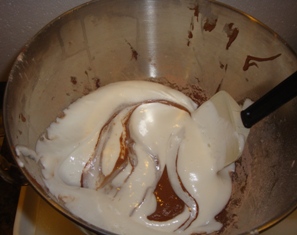 Fold the egg whites into the chocolate flour mixture